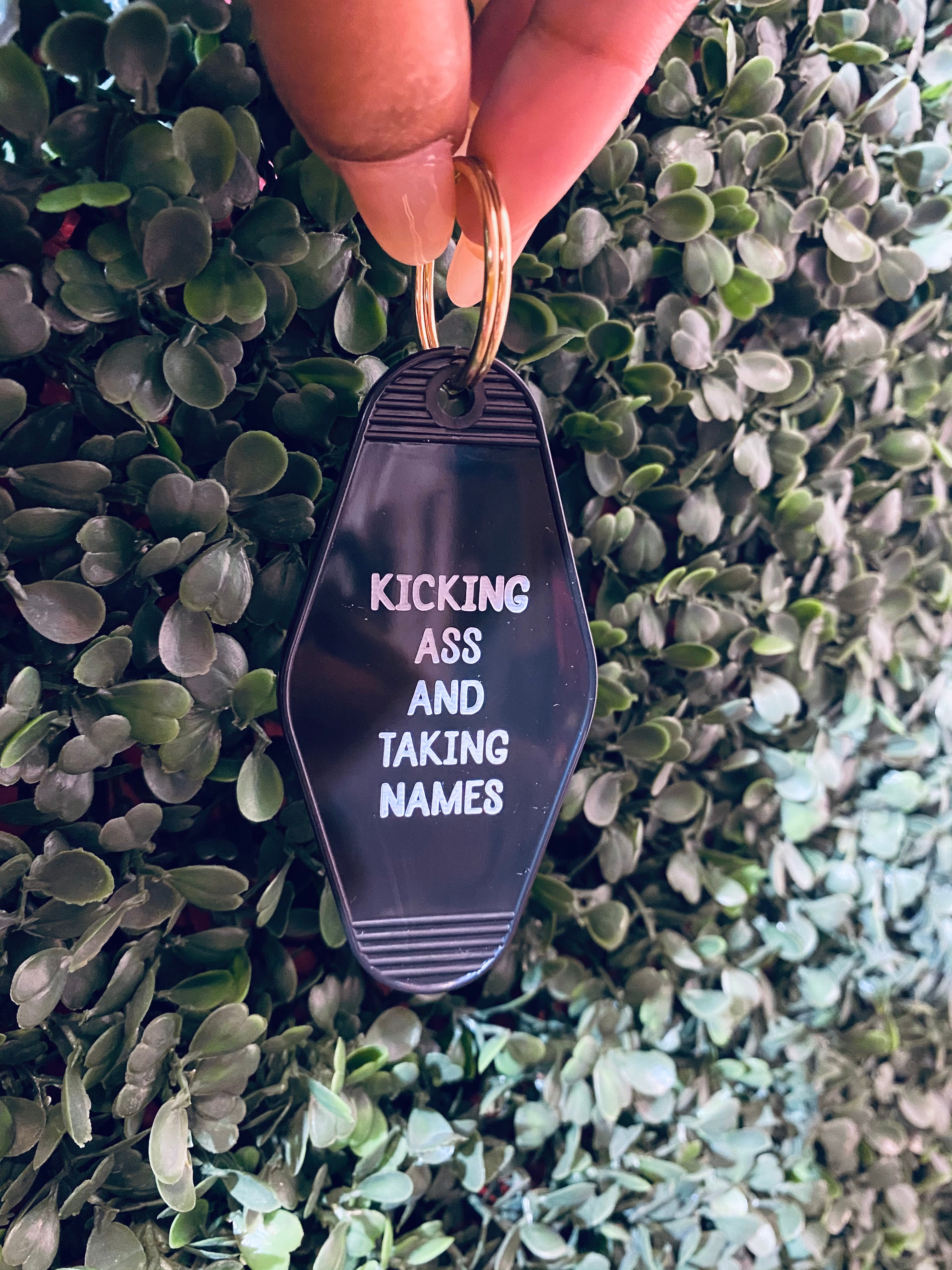 Kicking Ass And Taking Names Motel Keychain