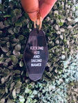 Kicking Ass And Taking Names Motel Keychain