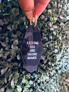 Kicking Ass And Taking Names Motel Keychain